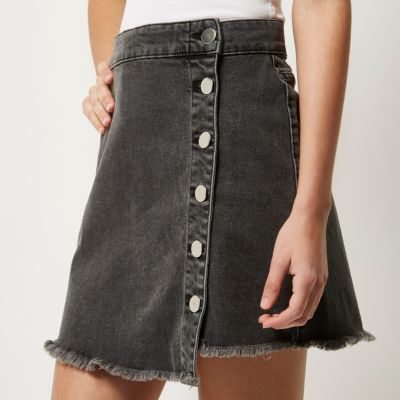Black wash denim buttoned mini skirt